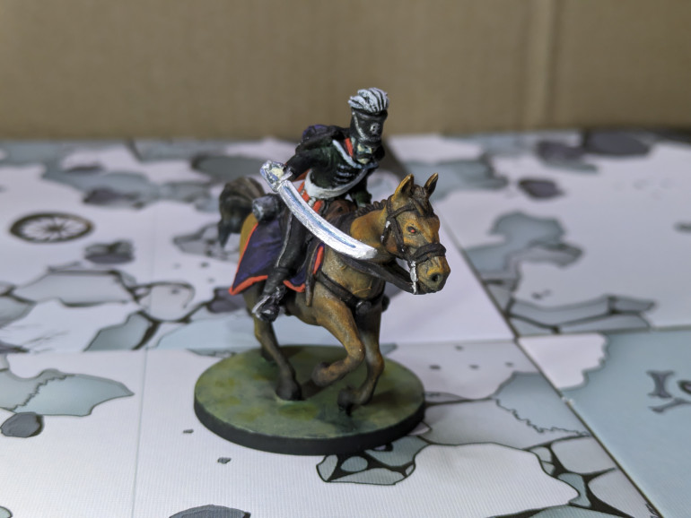 1st life Hussars seemed to fit in with his history and depiction so was used as inspiration.