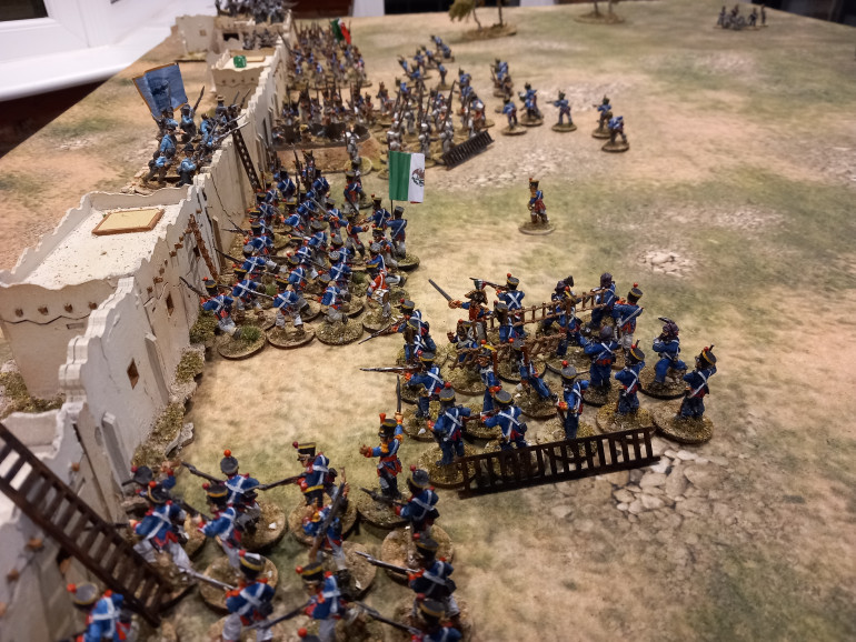 The force hits the walls and ladders are thrown up. One is immediately pushed over. Cazdor skirmishers give cover fire. To avoid anymore cannister shot the infantry climb the redoubt but are beaten back by a desperate crew. Mexican artillery after prolonged bombardment puts a breach in the wall