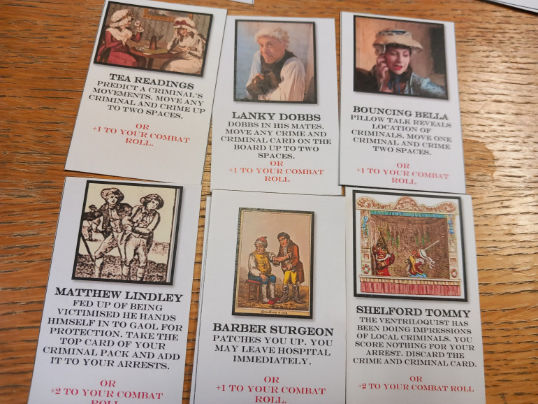 Some real life characters pop op in these cards. Lanky dobbs and bouncing Bella were members of the coney gang. Matthew Lindley was water boarded in the market square by the mob after refusing to sell them gunpowder after hours. They wanted to burn an effigy of Thomas paint the political agitator who demanded democracy urgh. Shelford Tommy used to throw his voice fooling people into thinking a amsll child was in the good or a fish on a plate was alive. Please don't cut my head off a kitchen made swore the fish said.