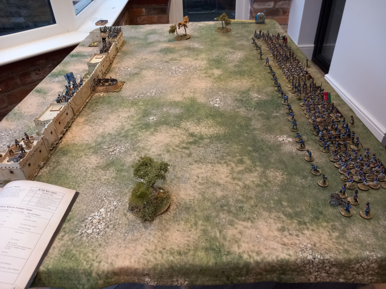 My set up for the scenario. The walls are finley guarded against the avalanche of Mexicans. The Mexicans have to get four of their 8 units over the walls.