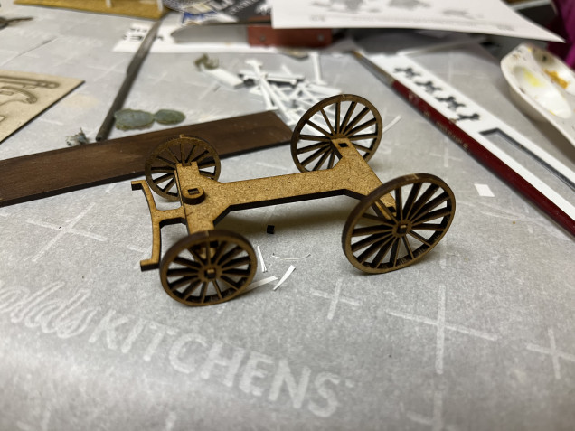 I decided to start work on the stage coach. This is the undercarriage and suspension. I’m going to pattern this stagecoach after the Wells Fargo line and their coaches have a two tone scheme with the undercarriage being yellow. 