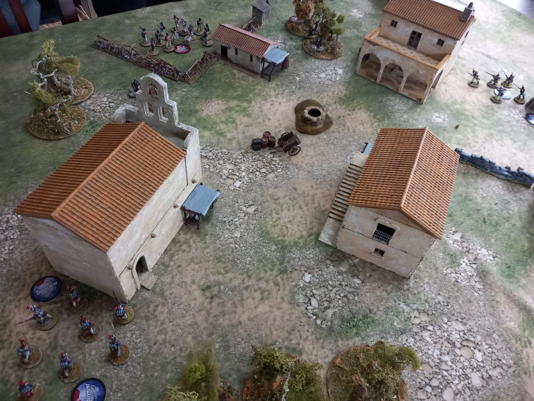 A game of the muskets and tomahawks napoleonic version shakos and bayonets. Skirmish level with just three or four units a side. The British have been raiding French supply lines but are ambushed by French camped out in a Spanish village. Can the British get their booty across the table.