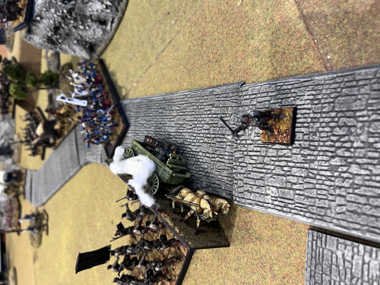 Then in an unbelievable feat of battle fury, the Uruk hai general passes his moral check, charges the empire Arquebusiers and causes them to panic and flee. He catches and destroys them! Fprcing neighbouring empire units to flee en masse. The head of the empire column collapses and one wagon exits the table. 
