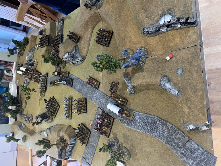 Ambush the Imperial wagon train. First turn and the hidden surprise has not been revealed. The orcs surge forwards and the imperials turn to face the threat. Minor orc and goblin damage from imperial fire power. The light cannon unlimbers and turns to face.