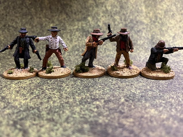 The Outlaws. Being bad guys, their gang trait is called Killers. They get bonuses on wound rolls from shooting attacks. 