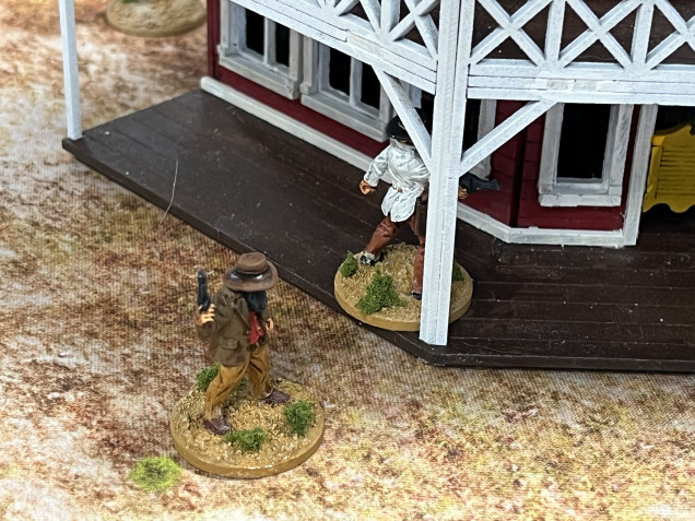 A couple of ne’er-do-wells creeping around the saloon. 