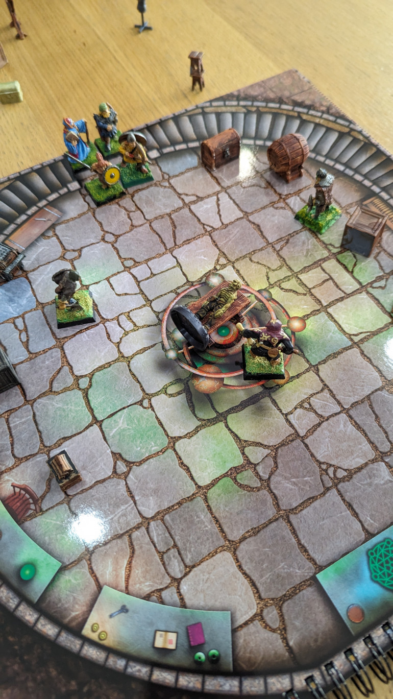 Turn one: the shaman performing necromancy as the rangers burst in. 