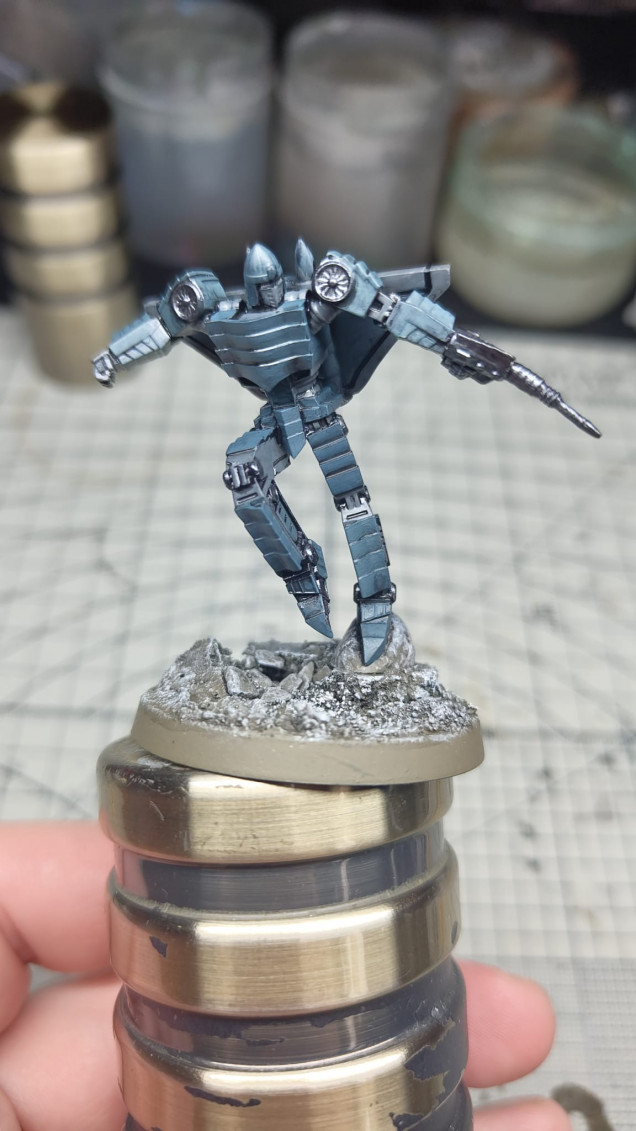 P3 Armour Shade washed over the whole model and base, 