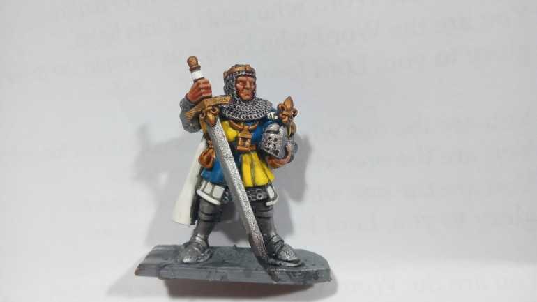 Sir Bernard himself. I wanted the Pilgrims to be like him but not at the same time so I kept the Blue and Yellow colour scheme but muted it down into a dark blue and light brown more suitable for a peasant.
