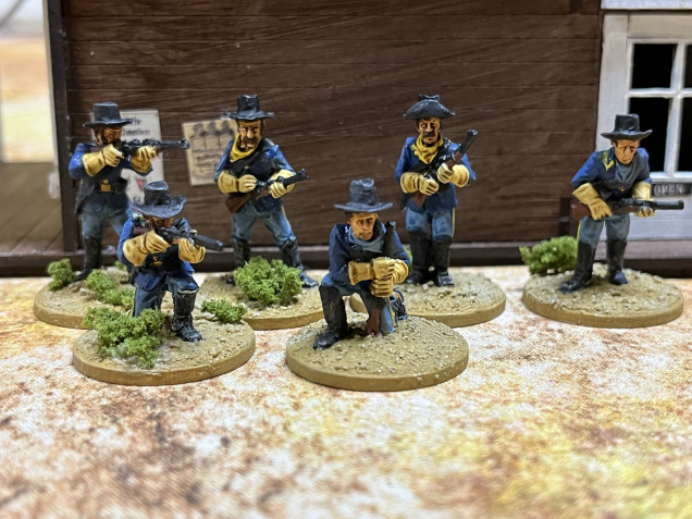 The rest of the troopers in pretty much standard campaign dress with civilian kerchiefs.