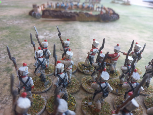 On the second turn Mexican grenadiers appear behind the texans as reinforcements start a flanking manoeuvre 