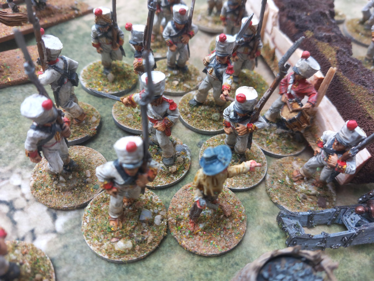 On the opposite side of the square a sole surviving artillery man has no chance against Mexican bayonets
