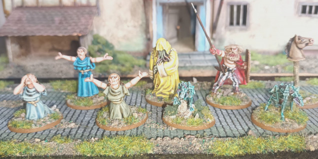 Some Cultists, an avatar of the King in Yellow and a hero from the Cultists Germanic faction with two hunting Hounds of Tindaloos. 