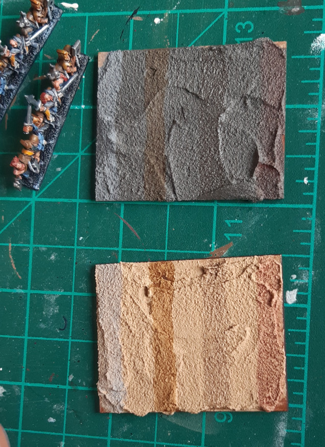 My test bases. The two texture pastes were Vallejo Dark Earth and AK Desert Sand. A band of four washes was applied to both - Vallejo Grey, Flesh, Umber  and Sepia washes.