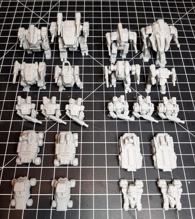 Two built forces. I cramed as much firepower on these things as I could. Missiles all around. I'll have to look up what to call them and let you know next time. I ownly broke one of the mechs.  Sure enough, snapped  the gun right at the connection point.  Lining up a resin break is a pain in the arse. 