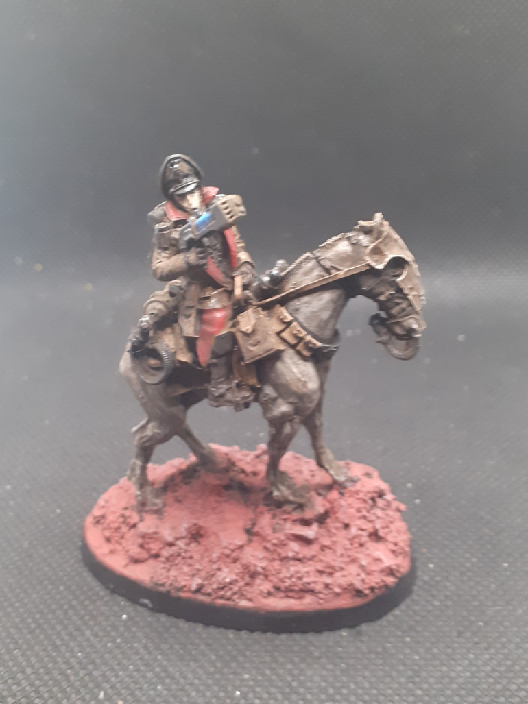 Horsey command unit, this chap is a forge world commissar that I have had knocking about for a while