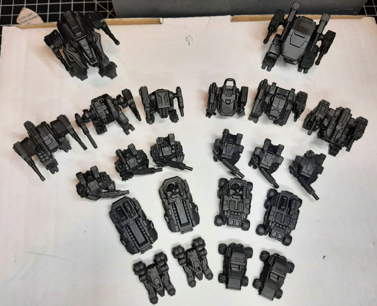 Primed em all black with the airbrush. Decided against the spray can to get into all the nooks and crannies without loading paint on other areas.