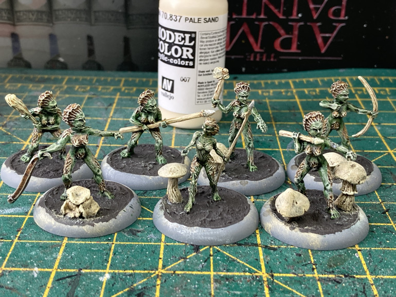 The miniatures were then drybrushed with Pale Sans.