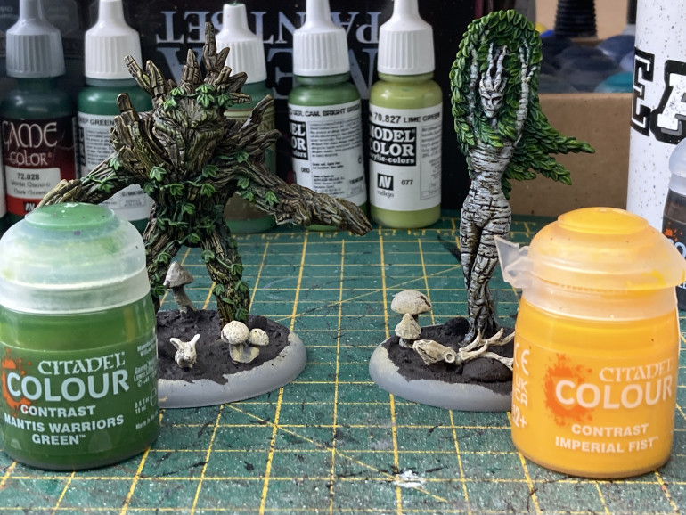 For the treeman I gave the leaves a glaze of Mantis Green Contrast and for the treewoman Imprerial Fist contrast for her leaves.