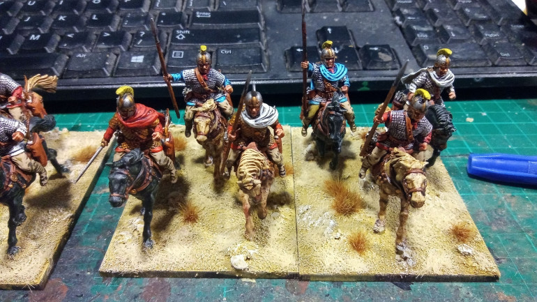 I wanted above all to keep them historically accurate and so I used a lot of red and off white, both cheap and well used colours. I mixed in some blue as well for the same reasons.