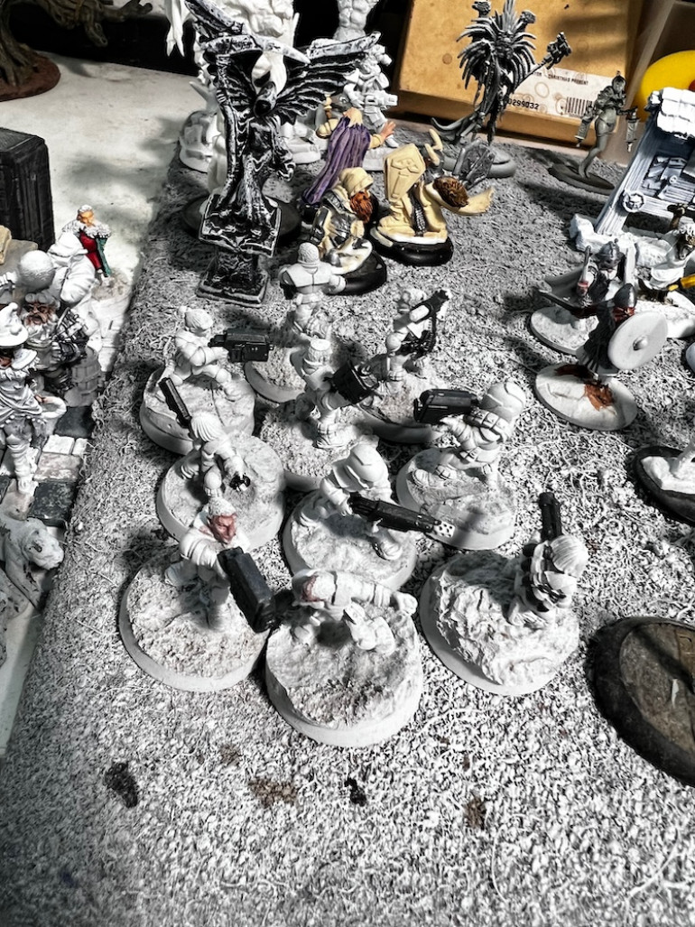 A big block of Hasslefree Grimm (Space Dwarfs) are waiting for color.  They have been on the table almost a year now.