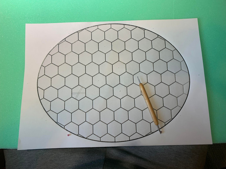 The first thing was to print out a hex grid on paper to use as a template. The hex sizes aren't that important for BotS, as long as your minis fit neatly within them.
