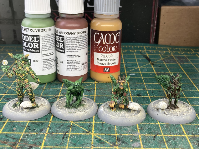 To add interest and colour(other than green) I used Mahogany Brown and Plague Brown to patches of leaves on the Green Man, and the fury spirit. Olive Green was used to highlight the Ork Flesh and a very thin coat was given to the green areas on the Green Man.