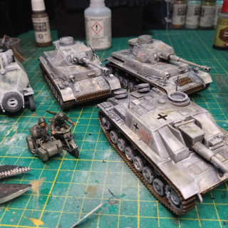 Build and paint 5 Bolt Action vehicles.