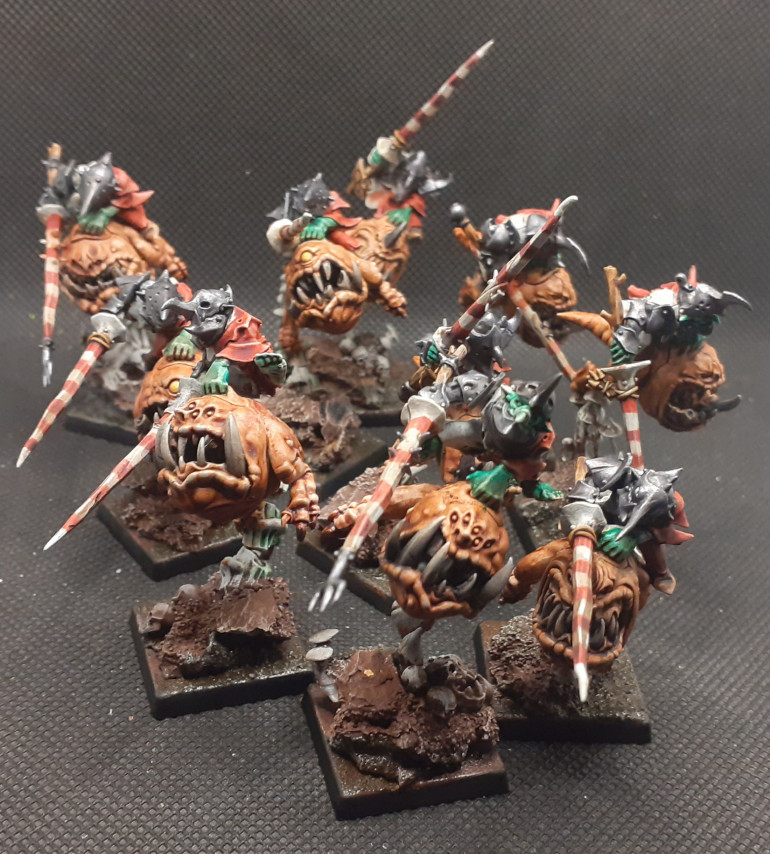 A unit of 10 squig riders, been trying to get 2000 points of old world orcs and goblins. Speed paints have helped a lot, only have the army's boss and a giant left to paint