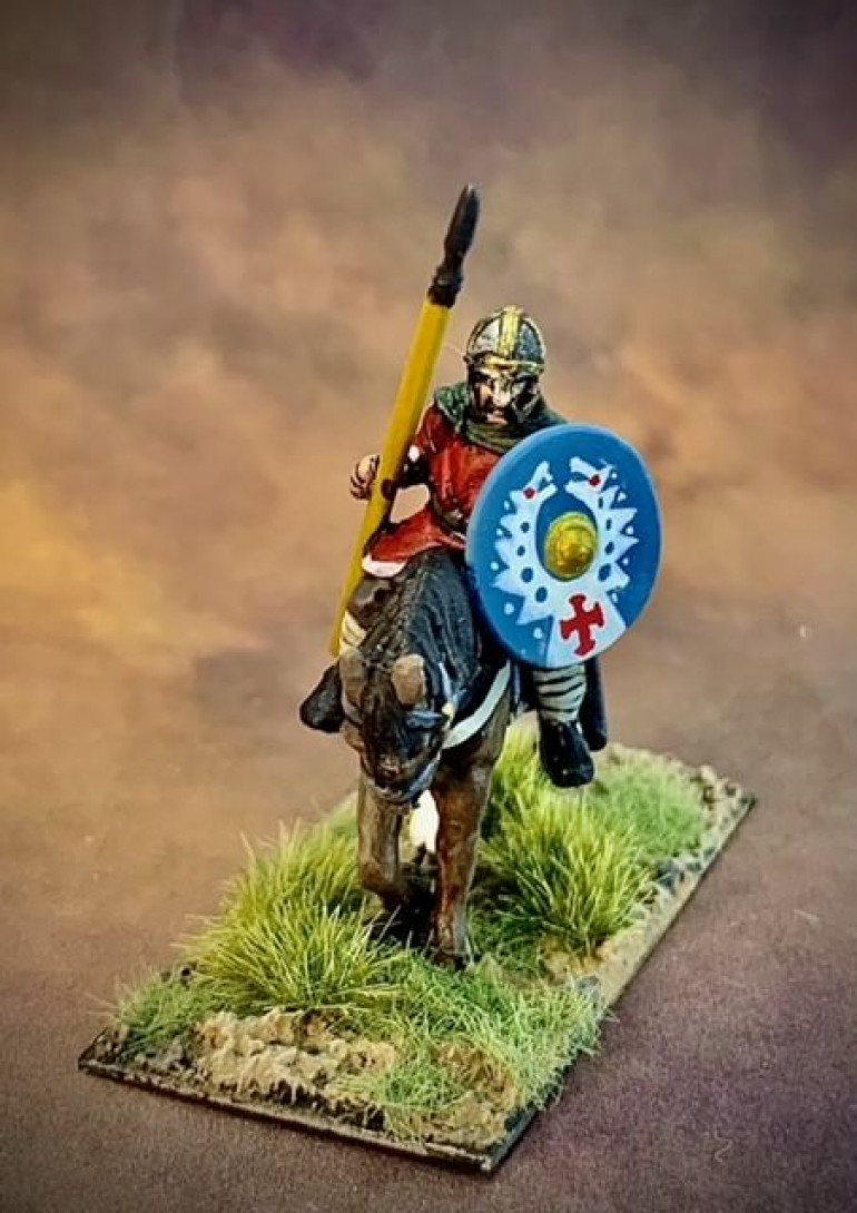 Sir Kay shows off his newly painted shield