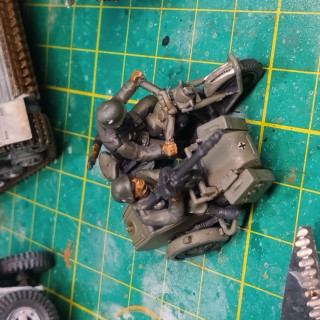 Build and paint 5 Bolt Action vehicles.