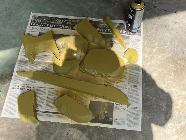I used some Vallejo Desert Yellow spray once the primer dried.  Some spray paints will react to foam so that’s why I did a brush on primer first.  As this is insulation foam it has some pre-cut lines I’ll need to fill in.  