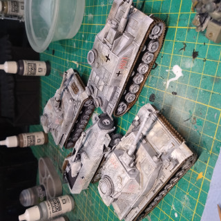 Build and paint 5 Bolt Action vehicles.