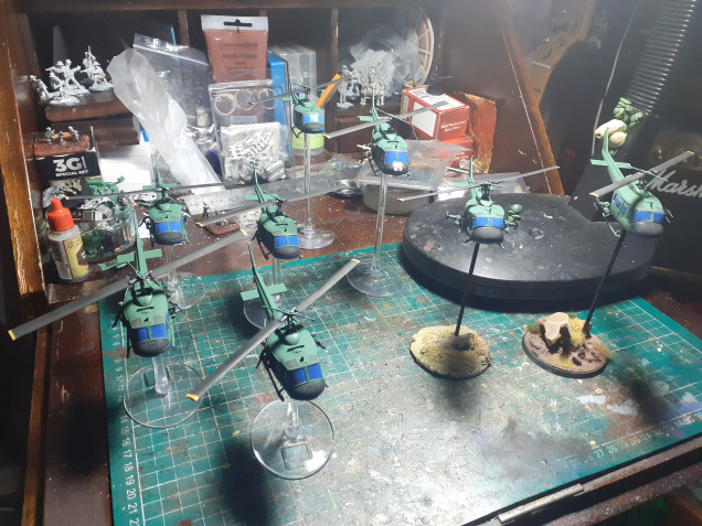 The hueys painted and ready for the table. There is a unit of 4 slicks for transporting troops as well as 2 huey hogs for fire support. There is also a med evac huey and a command and control helicopter.