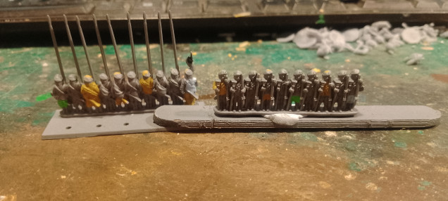 Spray the entire unit Army Painter Uniform Grey.