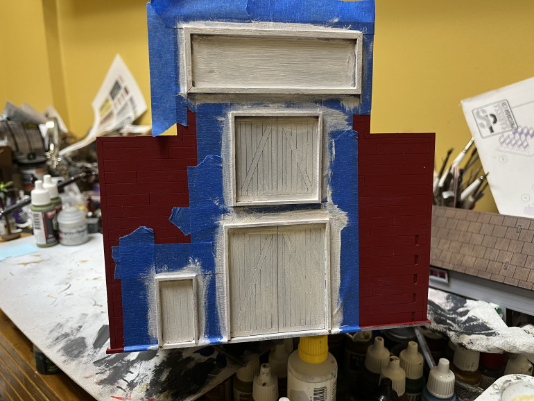 Did a quick bit of masking then painted up the front doors and signs.  