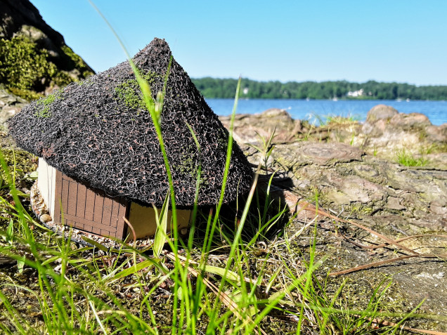 A lone roundhouse stands on the shore after the flood