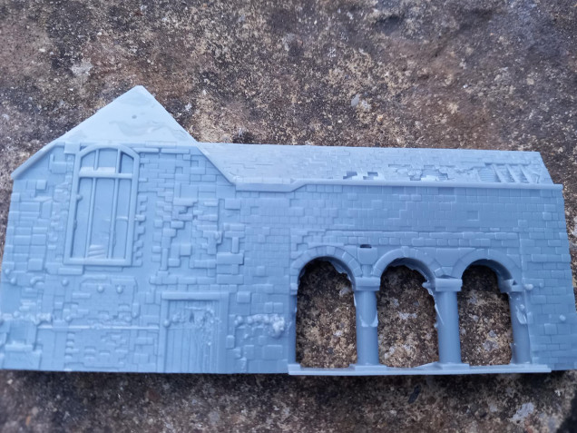 This first attempt created a small model where some of the features werent visible and as you can see the print failed near the top. But it did kind of work so I went back to the slicer.