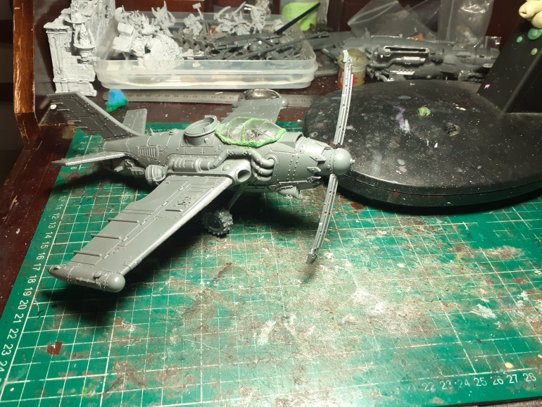 The BF Waaagh 09 ready for a splash of paint, the nose cone is a chopped up bomb with landing skids stuck on to make the propeller 