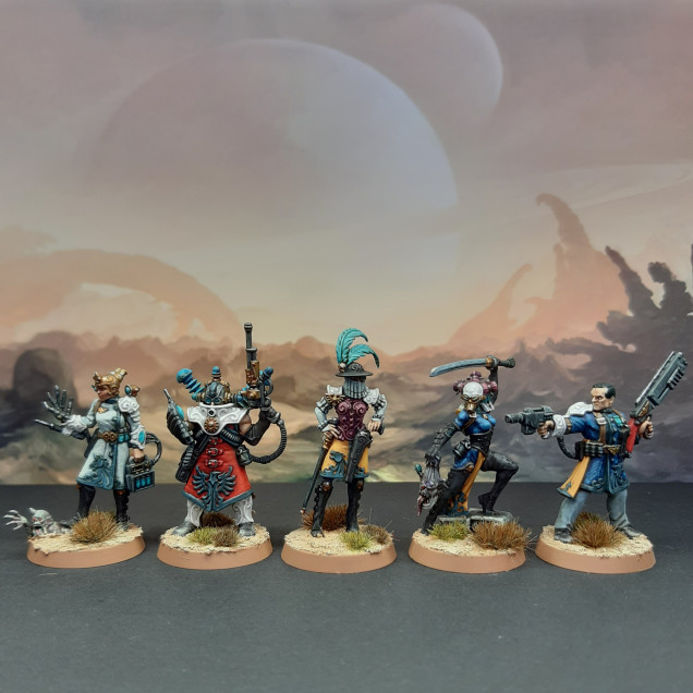 Second half of the Elucidian Starstriders Kill Team, which essentially covers all the Rogue Trader and her officers. I tried to give each figure a bit more individual colour schemes, whilst still keeping some sense of unity across the whole.