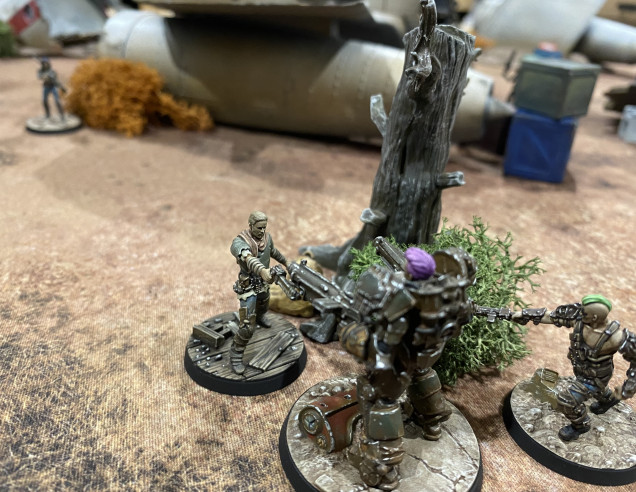 One of the settlers is unfortunate enough to get caught by the Raiders leader and ends up as a smear against a dead tree.