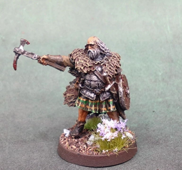 The basing with flower soft on a grass tuft should make him stand out nicely. The basing will be Forrest floor brown flock and stones and tufts. 