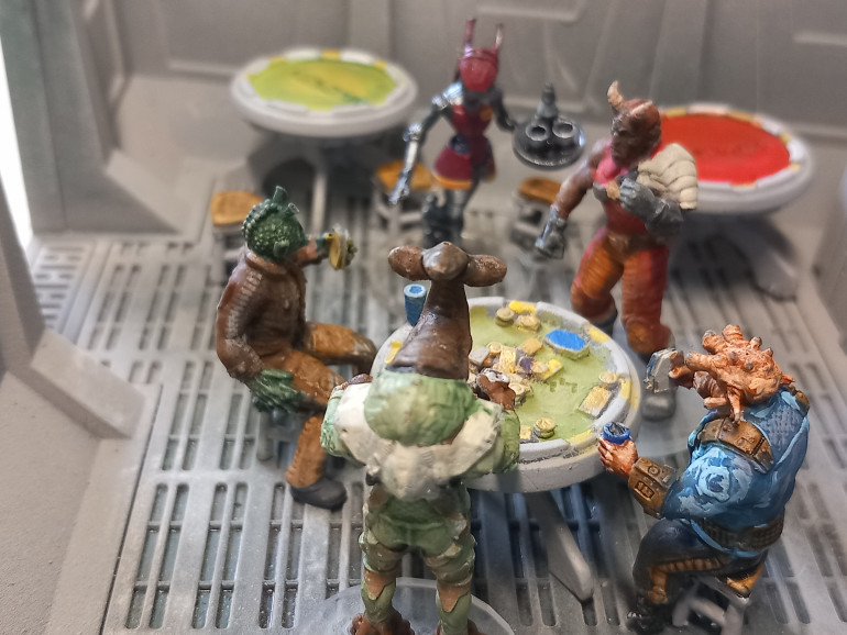 3D prints of a sabbac game. I like that the devaronian is about to go on the rampage and the rodian looks a bit confused but is going for his blaster any way