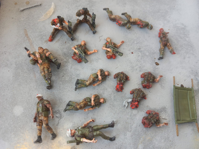 Some 3d prints by ravenx that fill in the gaps of colonial marine collections. Medics and the dead and dying. If you want to fill your table with body parts this is it. Nice for objective markers. I like the guy carrying his Wounded buddy to safety