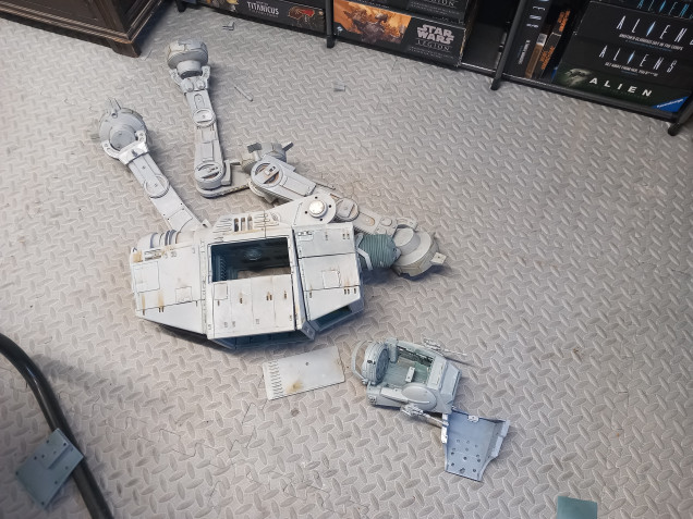 I went to work and came back and found it on the floor. Despite the brass rods and magnets it just can't stand up for long so using it in a game is impractical unless it's a wreck which is a shame but resin isn't strong enough 