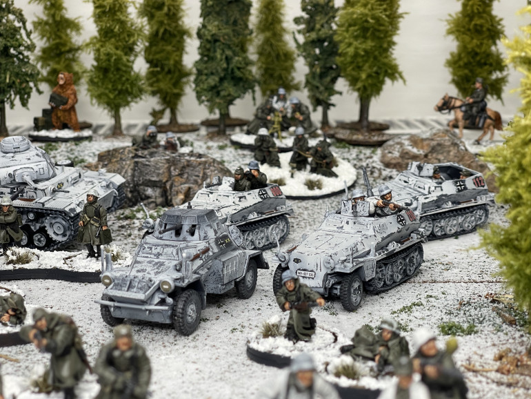 Recce Platoon advances through the forest