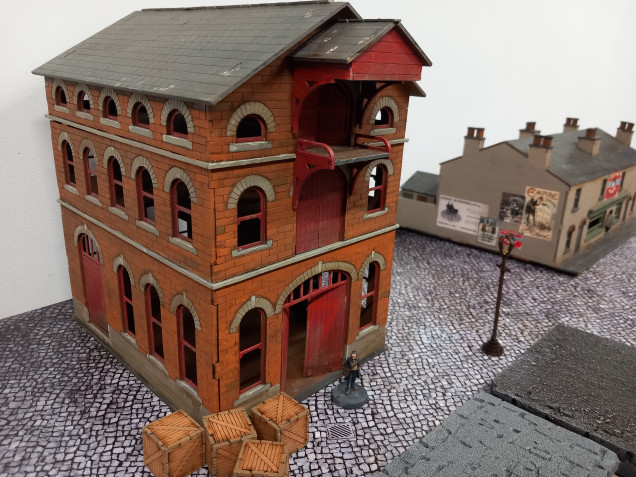 I've had this sarissa warehouse for some time and has been used in many different games. This was a good excuse to repaint it slightly and give it a fresh look.