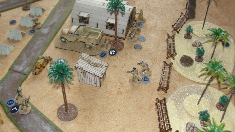 The raiders are now in position to place charges on the primary target of the supply truck. A German patrol still hasn’t been able to see the SAS officer crouching behind a pile of supplies and things are about to get noisy as the SAS prepare to open fire. 