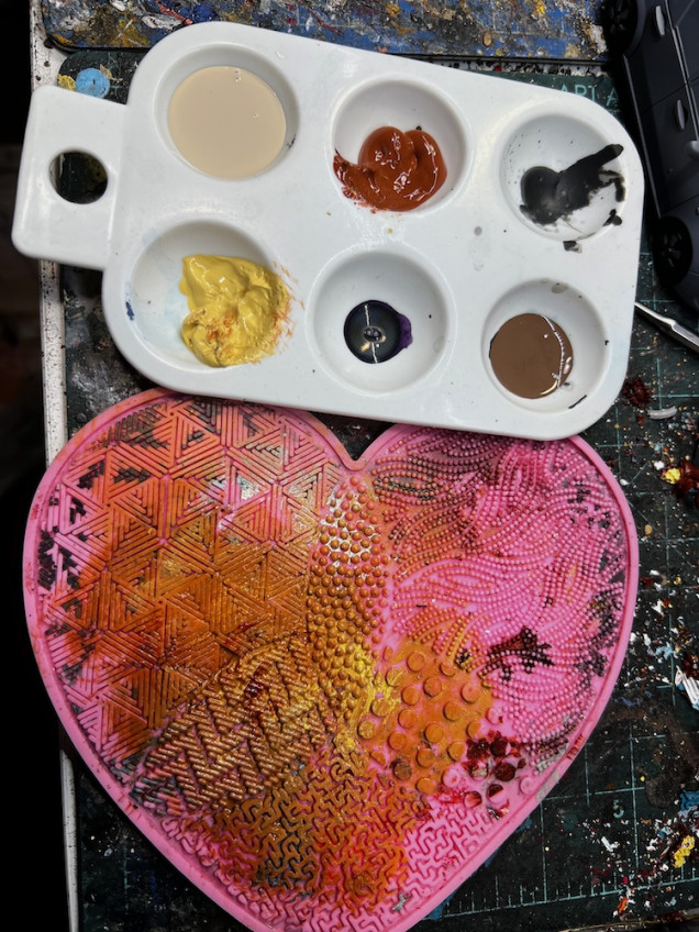 Here are some of the colors I used as well as my textured pallet.  It is made for makeup but works well with acrylics and is even easy to clean.