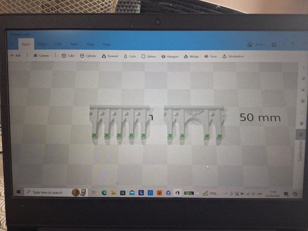 First I had a look through my files and found a 6mm scale building that had arches I liked. unfortunately I cant remember the artist but I do believe it was from thingiverse. I trimmed off the bits I didn't want and saved these two parts as samples.